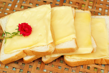 cheese the place on a slice of bread.