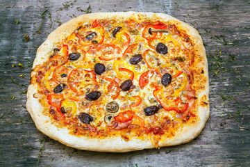 Delicious italian pizza served on wooden table