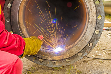 Metalworker working on a pipeline