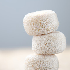 French fresh goat cheese on a wood desk
