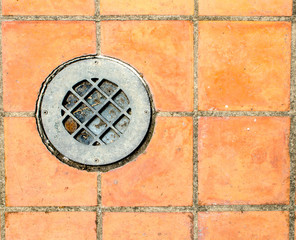 aged tiles square orange floor with spot light