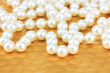 Color beads on bright background, close-up
