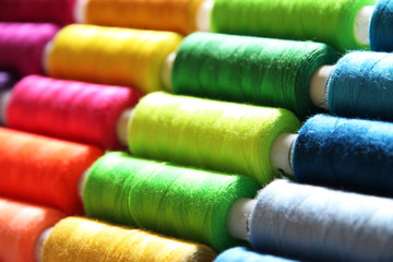 Multicolor sewing threads background