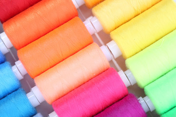 Multicolor sewing threads background