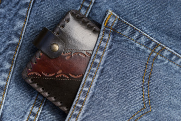 Leather wallet in a pocket