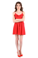 Beautiful young girl in red dress isolated on white