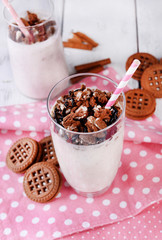 Milk cocktails in glasses and chocolate cookies