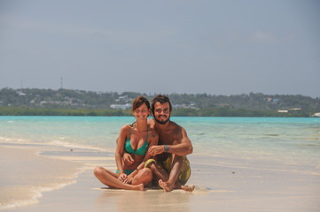 Couple in Love at Turquoise waters, San Andres tropical island,