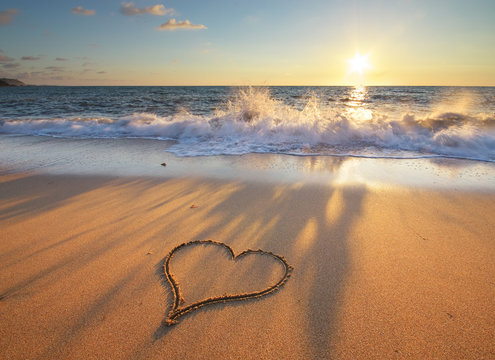 Heart on beach - Powered by Adobe