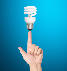 Ideas bulb light on  hand