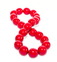 The red bead laid out as a figure eight