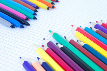 The felt pens and pencils placed diagonally