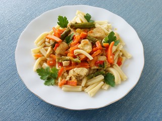 pasta with vegetables and meat as dinner meal