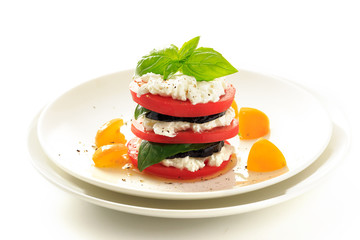 stacked eggplant ,tomato, basil and  cottage cheese