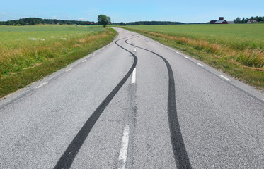Fototapeta premium Tire print on the asphalt road
