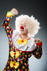 Funny clown in the studio