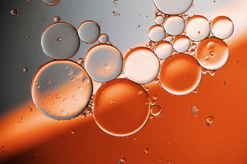 Oil drops on a water surface