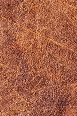Obraz na płótnie Canvas Artificial Eco Leather Brown Crumpled Texture Sample