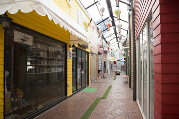 Fototapeta premium colorful shop in alley