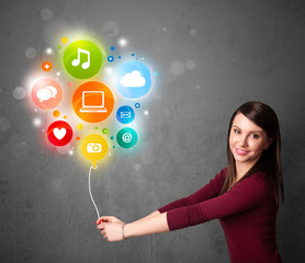 Woman holding social media balloon