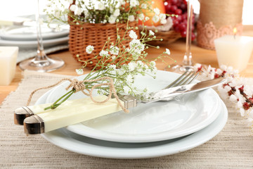 Table setting with spring flowers close up