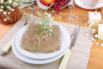 Table setting with spring flowers close up