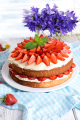 Delicious biscuit cake with strawberries
