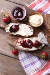 Fresh toast with homemade butter and strawberry jam