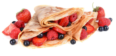 Delicious pancakes with berries isolated on white