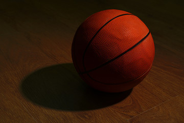 Obraz premium Basketball ball on floor