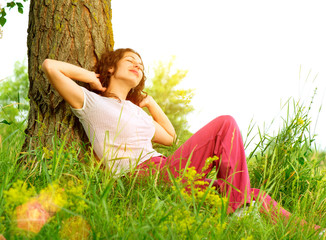 Beautiful Young Woman Outdoors Enjoying Nature