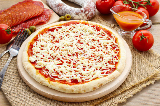 Italian cuisine: pizza with salami