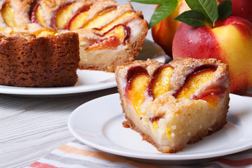 Slice of peach pie on a plate close-up. Horizontal