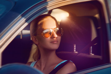 Beautiful caucasian female looking away in sunglasses