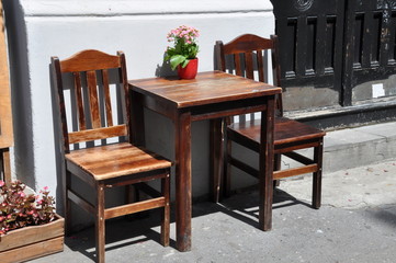 Wooden chairs and table, street rest