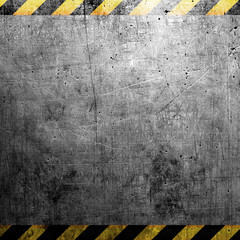 Industrial grungy steel plate with black and yellow strip