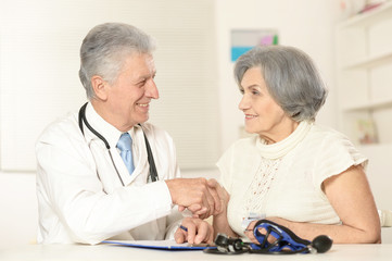 Fototapeta premium Elderly woman came