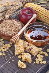 A fruit and nut ceral protein bars with honey and cornflakes