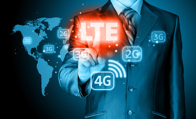 businessman is pushing his finger on lte button