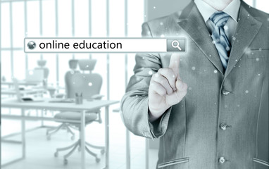 Online education written in search bar on virtual screen.