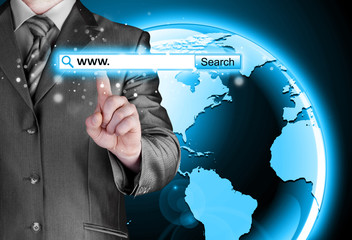 Businessman pushing virtual search bar