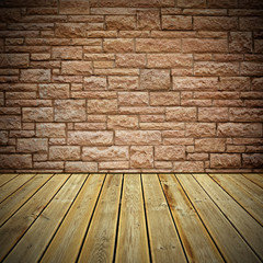 Wooden deck floor and stone bricks wall