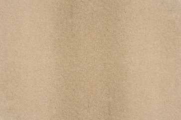 beige colored house front, structured with spatula techniques, b