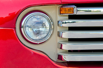 retro red truck headlight and grill