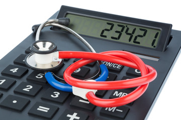 Stethoskop und Taschenrechner