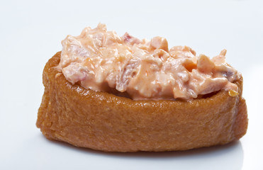 inari sushi with crab and roe tobiko
