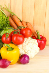 Fresh vegetables on wooden background