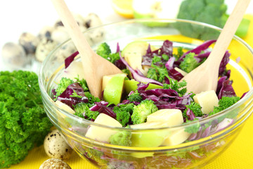Fresh vegetable salad in bowl isolated on white