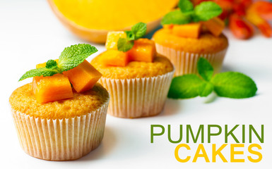 Tasty pumpkin muffins, isolated on white