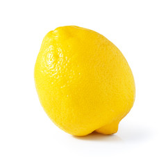 Yellow ripe lemon isolated on a white